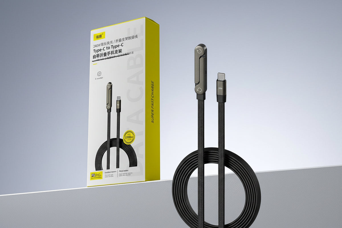 Black USB-C cable with phone holder next to its packaging on a gray background